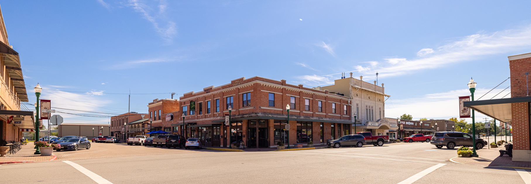 A parking lot in front of a building.