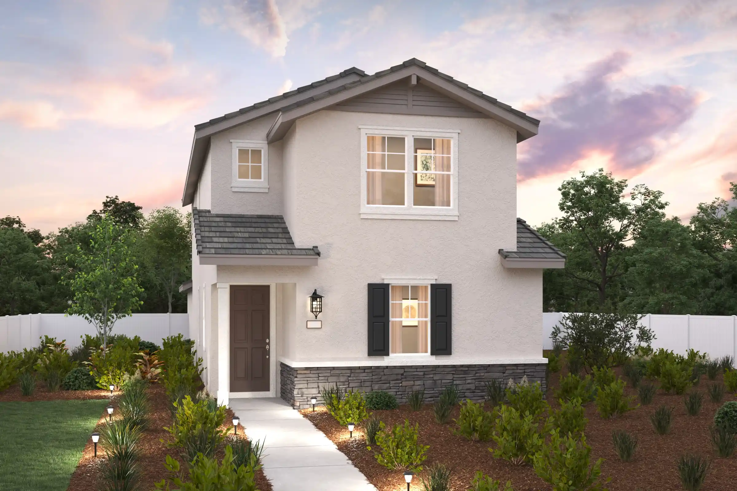 A white house with a driveway.