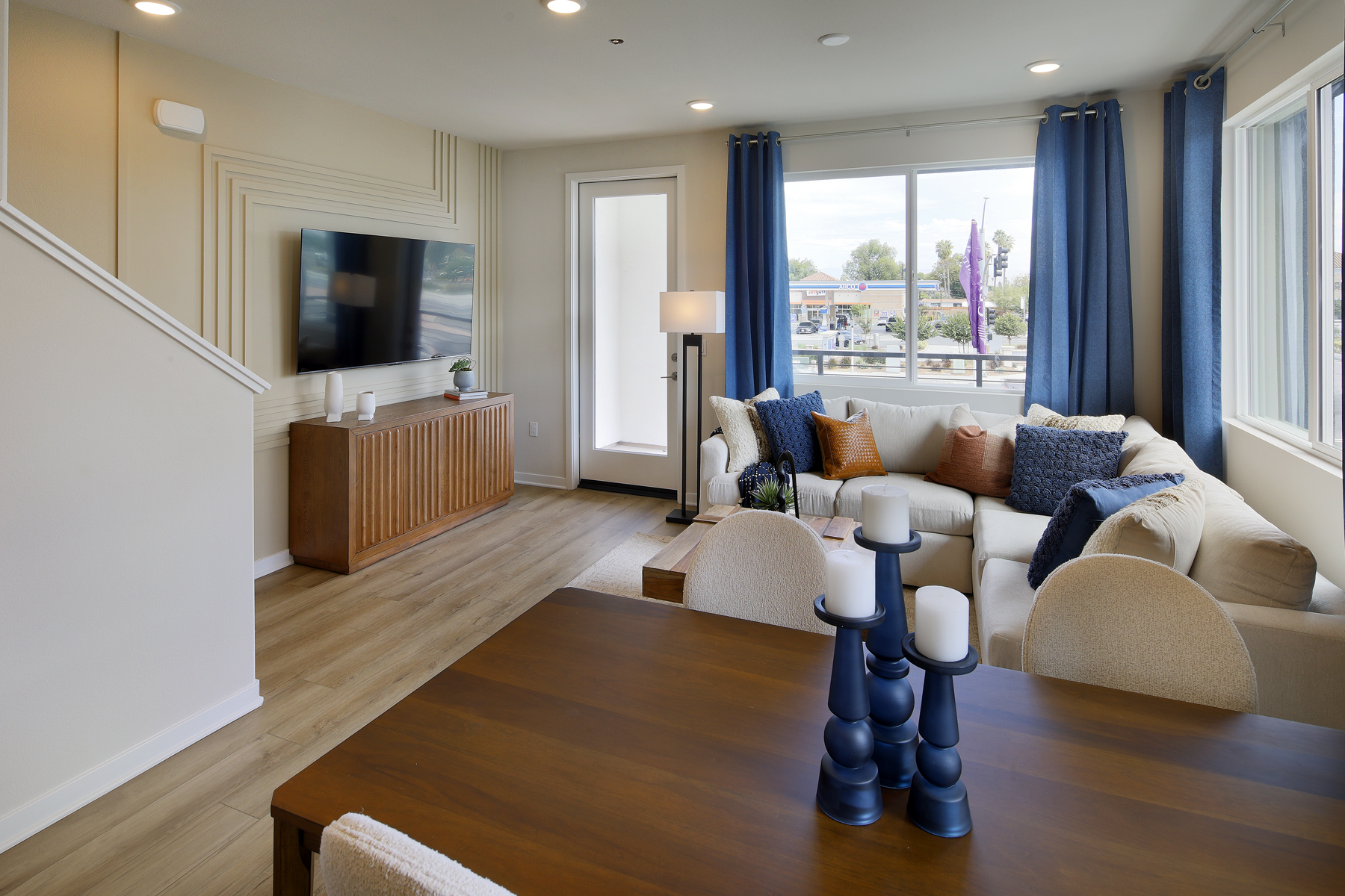 A living room with a large window.