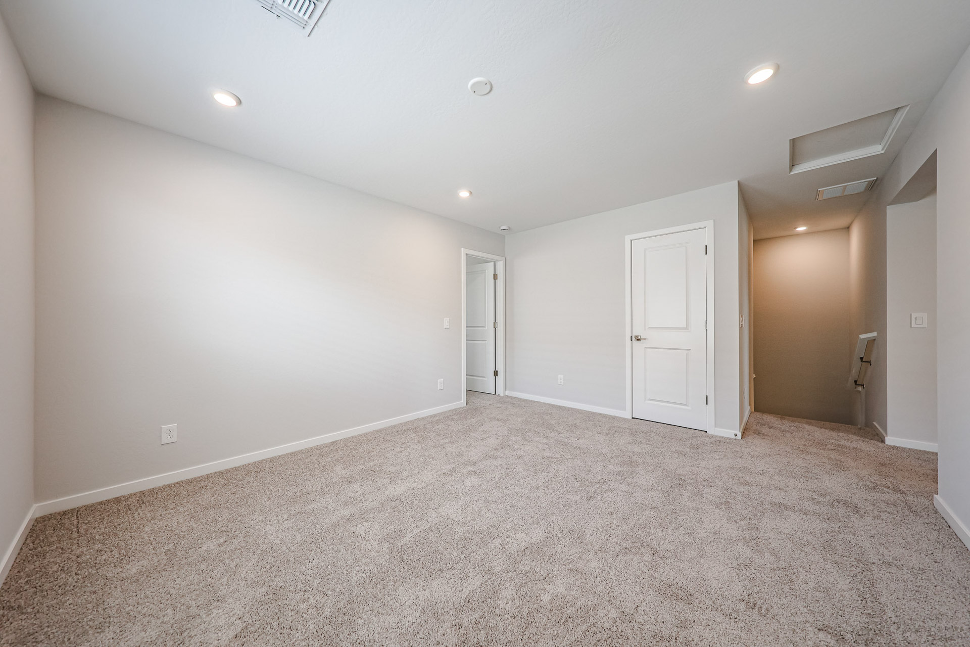 A room with white doors.