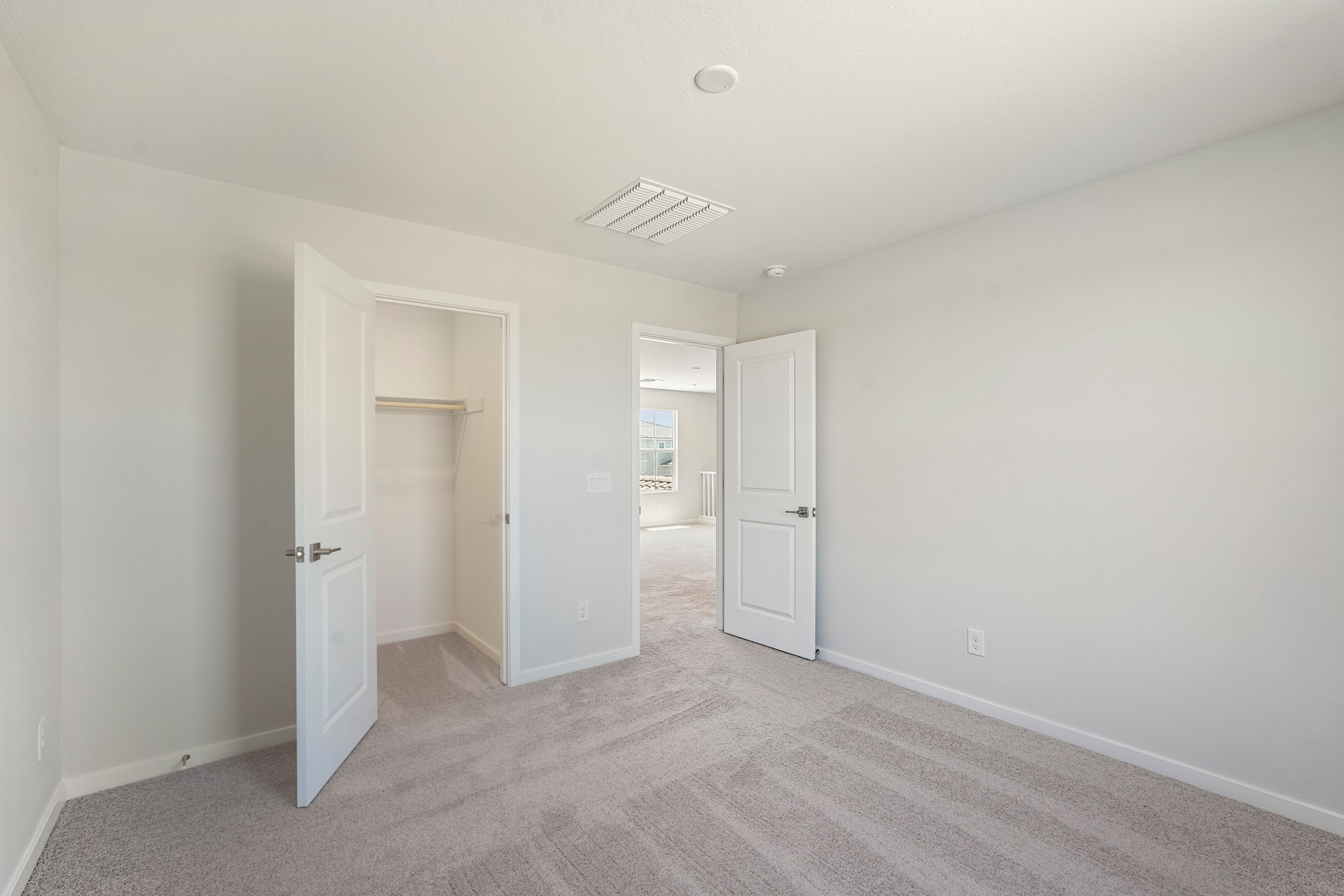 A room with white doors.