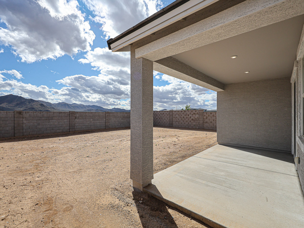 A building with a large stone wall.
