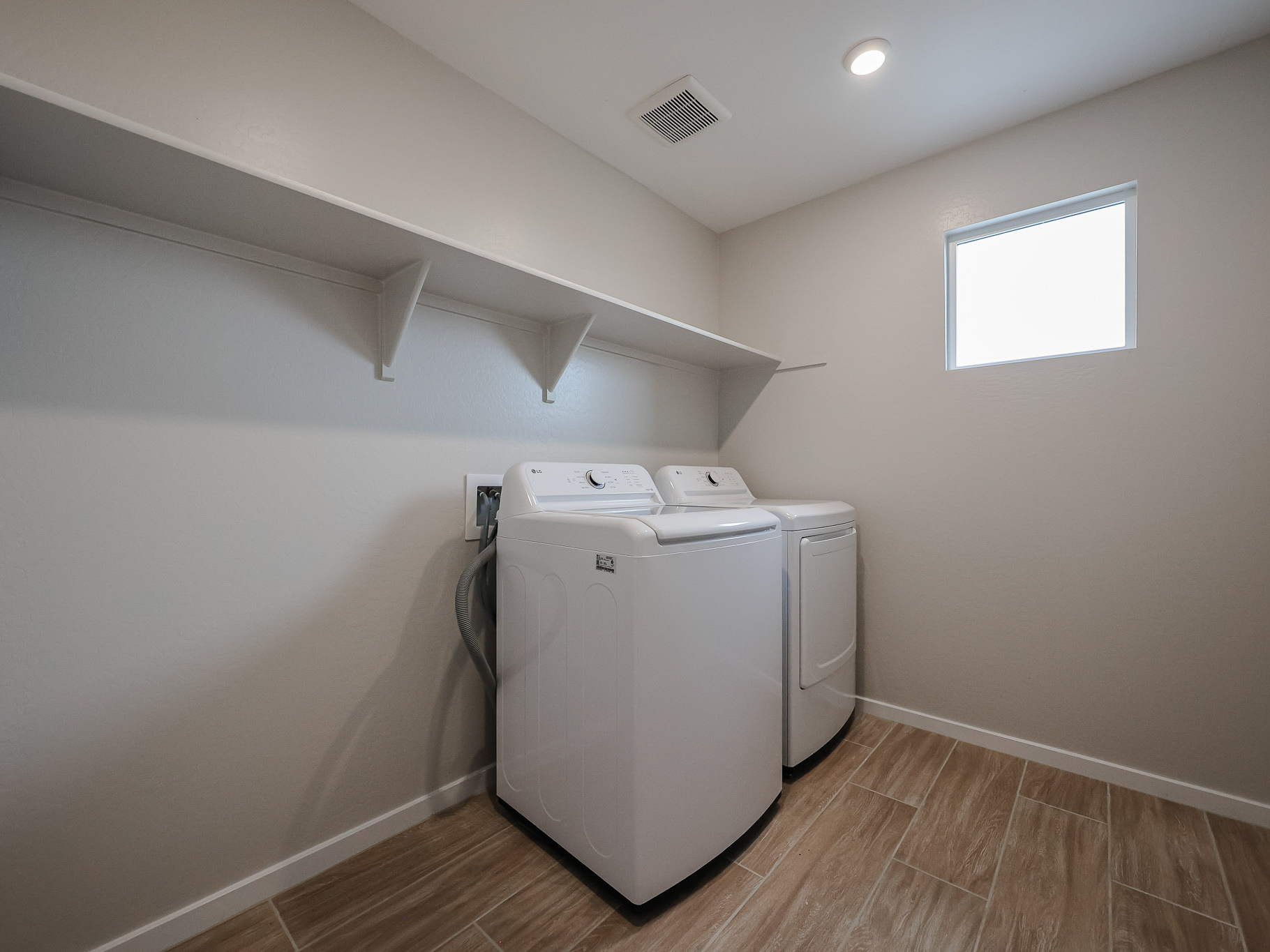 A white machine in a room.