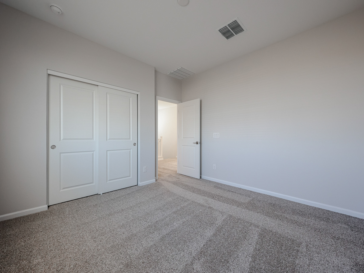A room with white doors.
