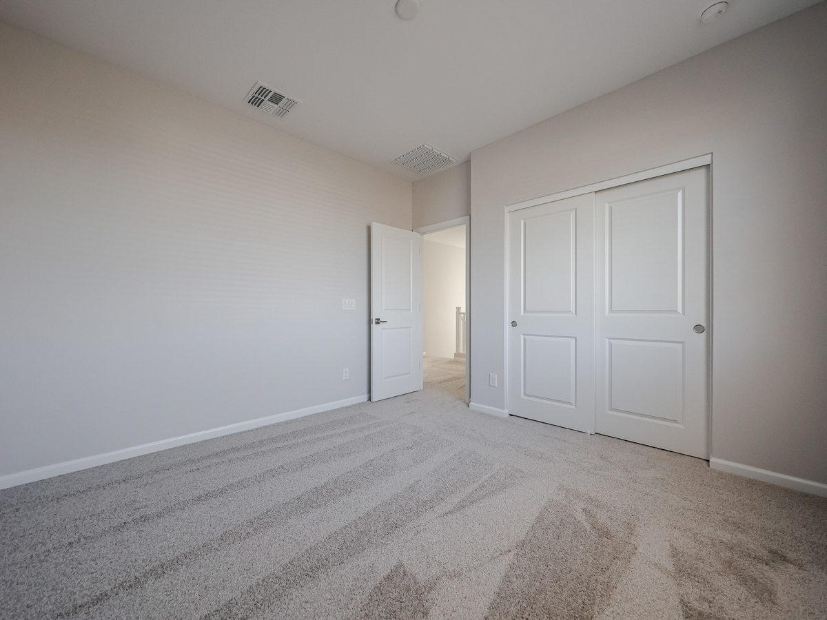 A room with white doors.