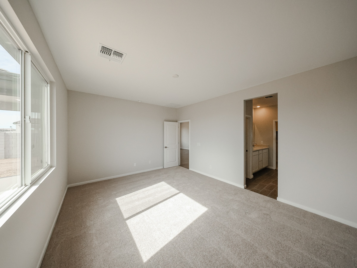 A hallway with white walls.