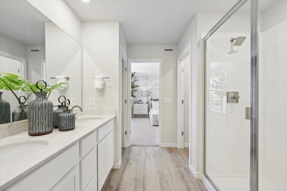 A bathroom with a glass shower.