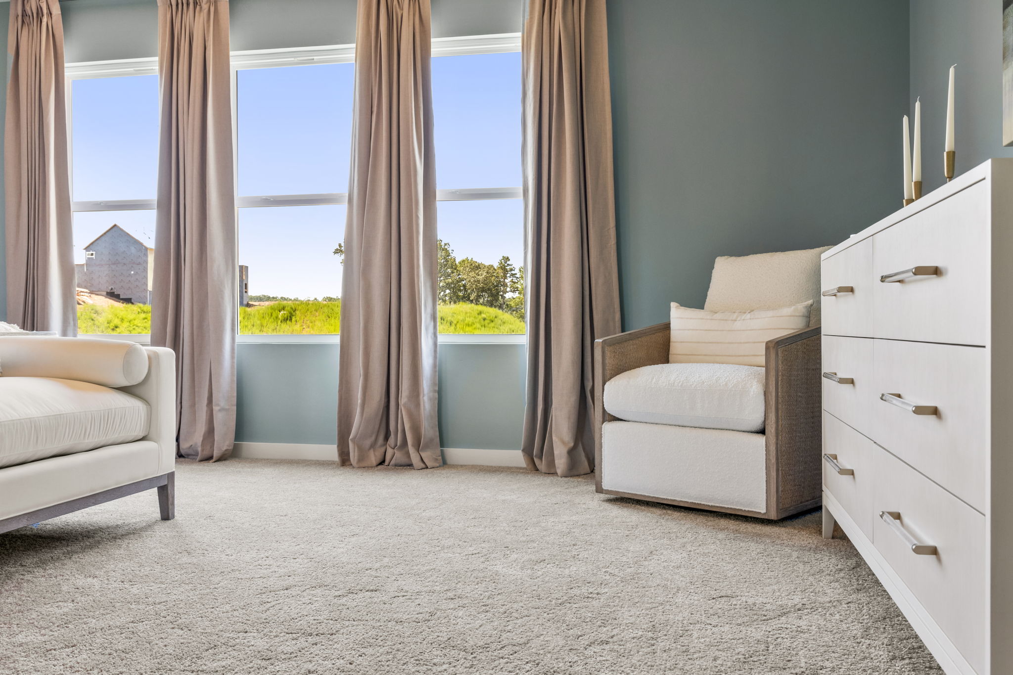 A room with a bed and a window.