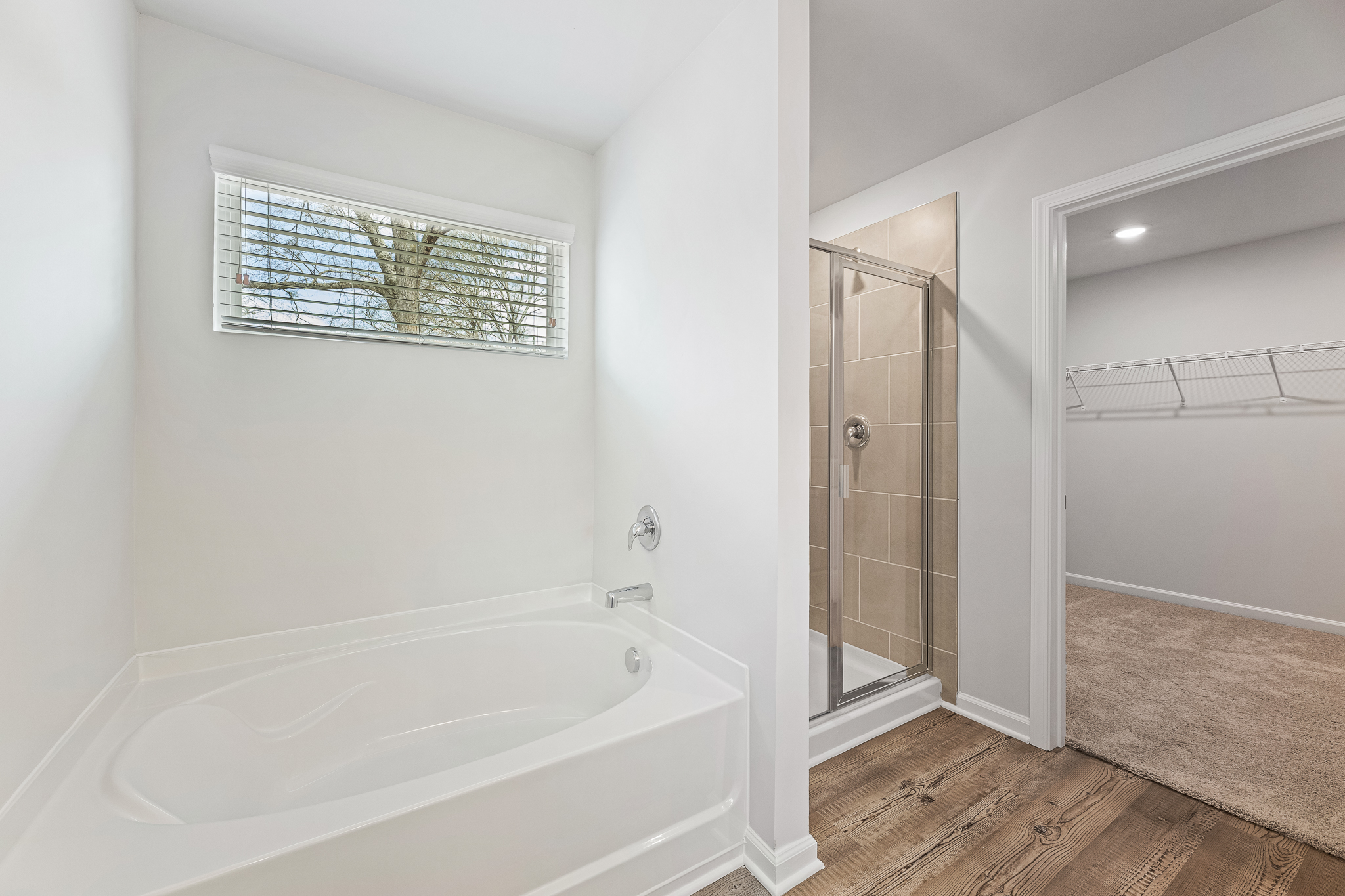 A bathroom with a glass shower.