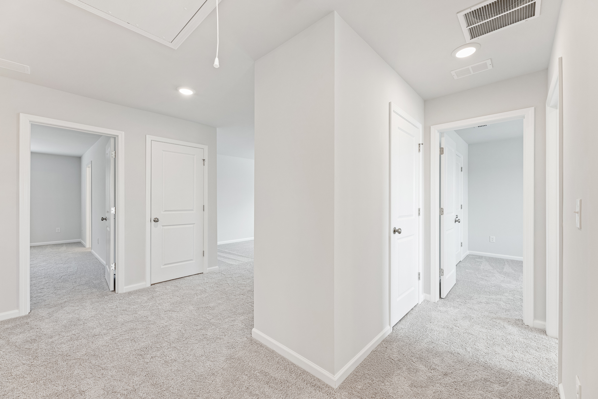 A room with white doors.