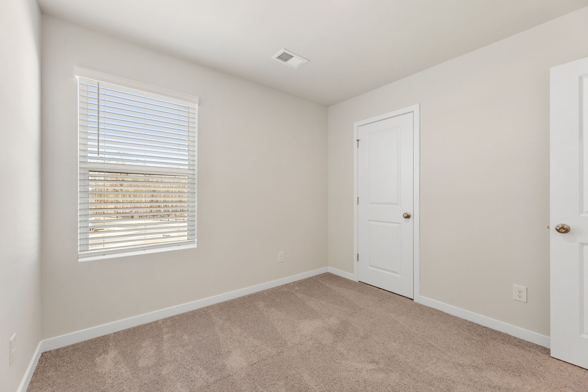 A room with white doors.