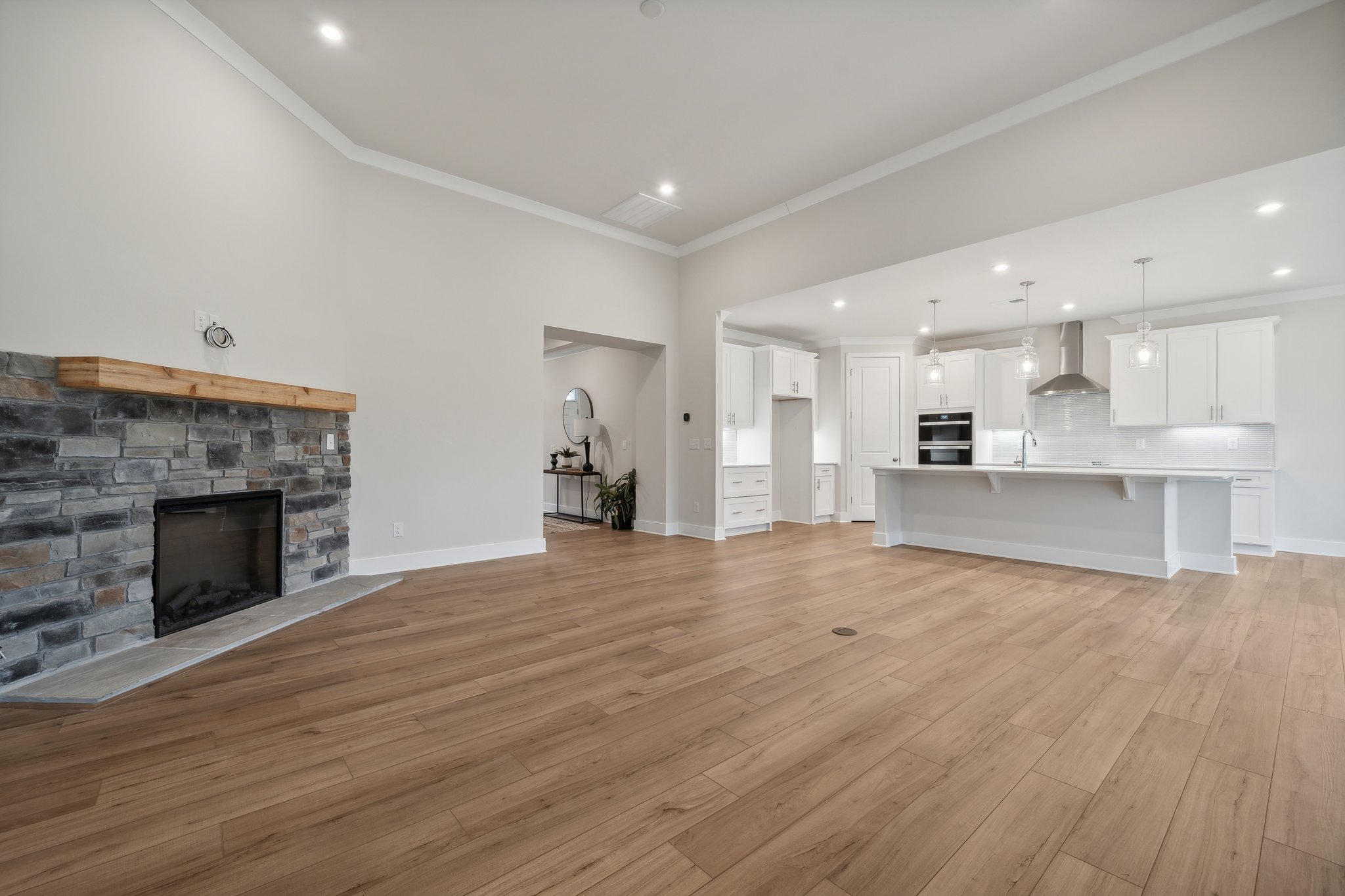 A large kitchen with a fireplace.