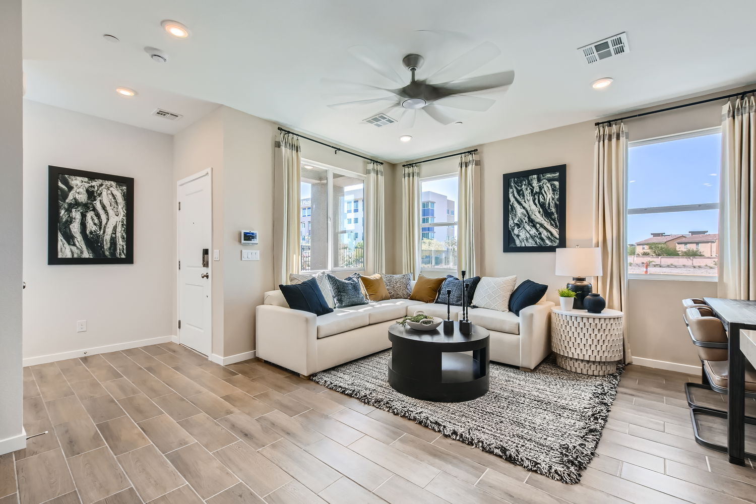 A living room with a large window.