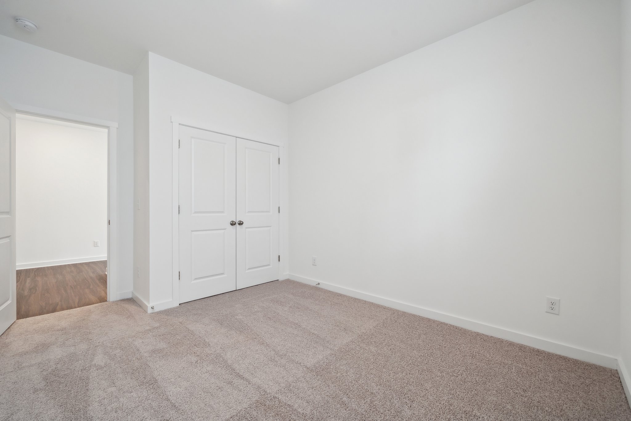 A room with white doors.