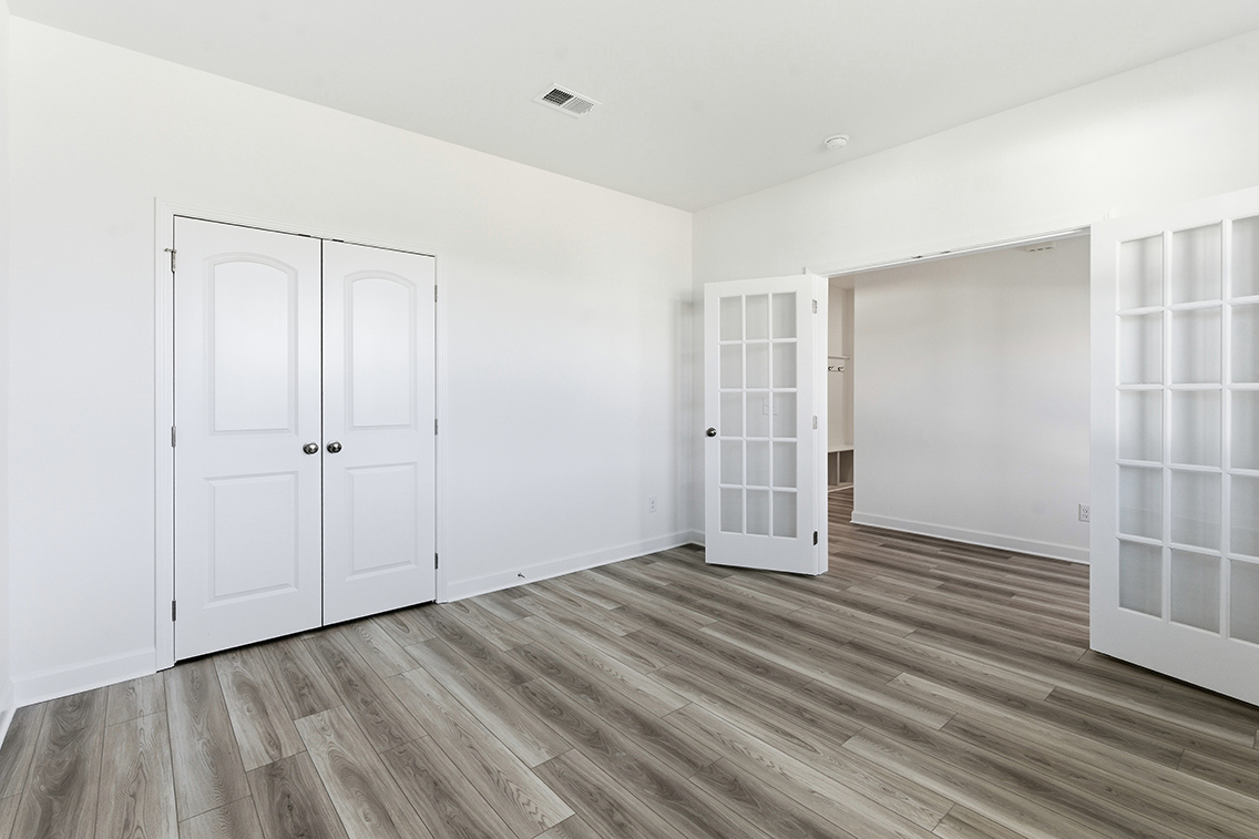 A room with white doors.