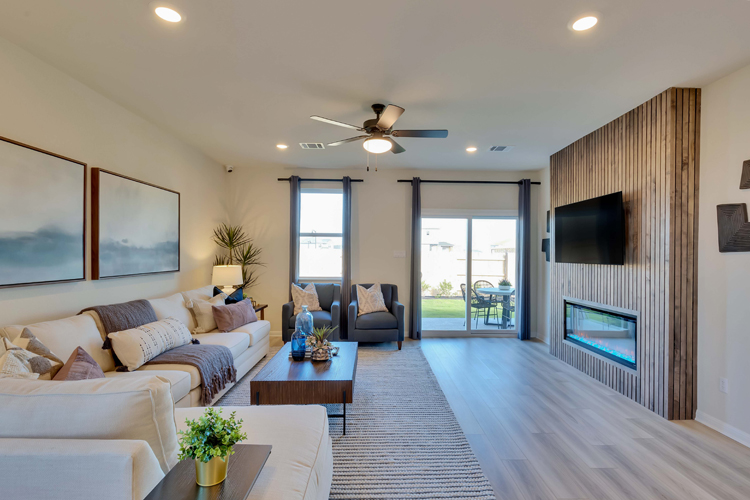 A living room with a large glass door.