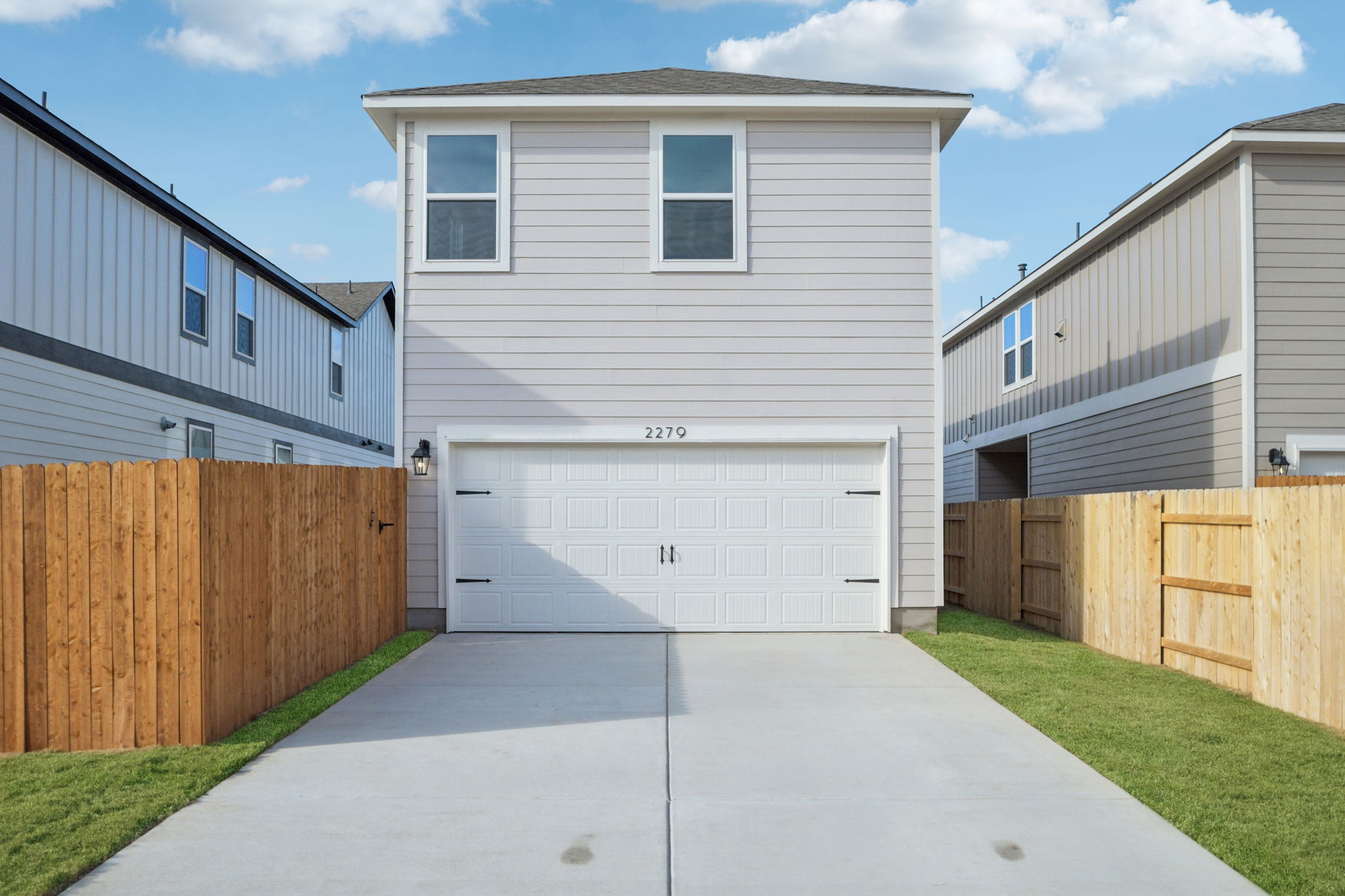 A garage in a backyard.