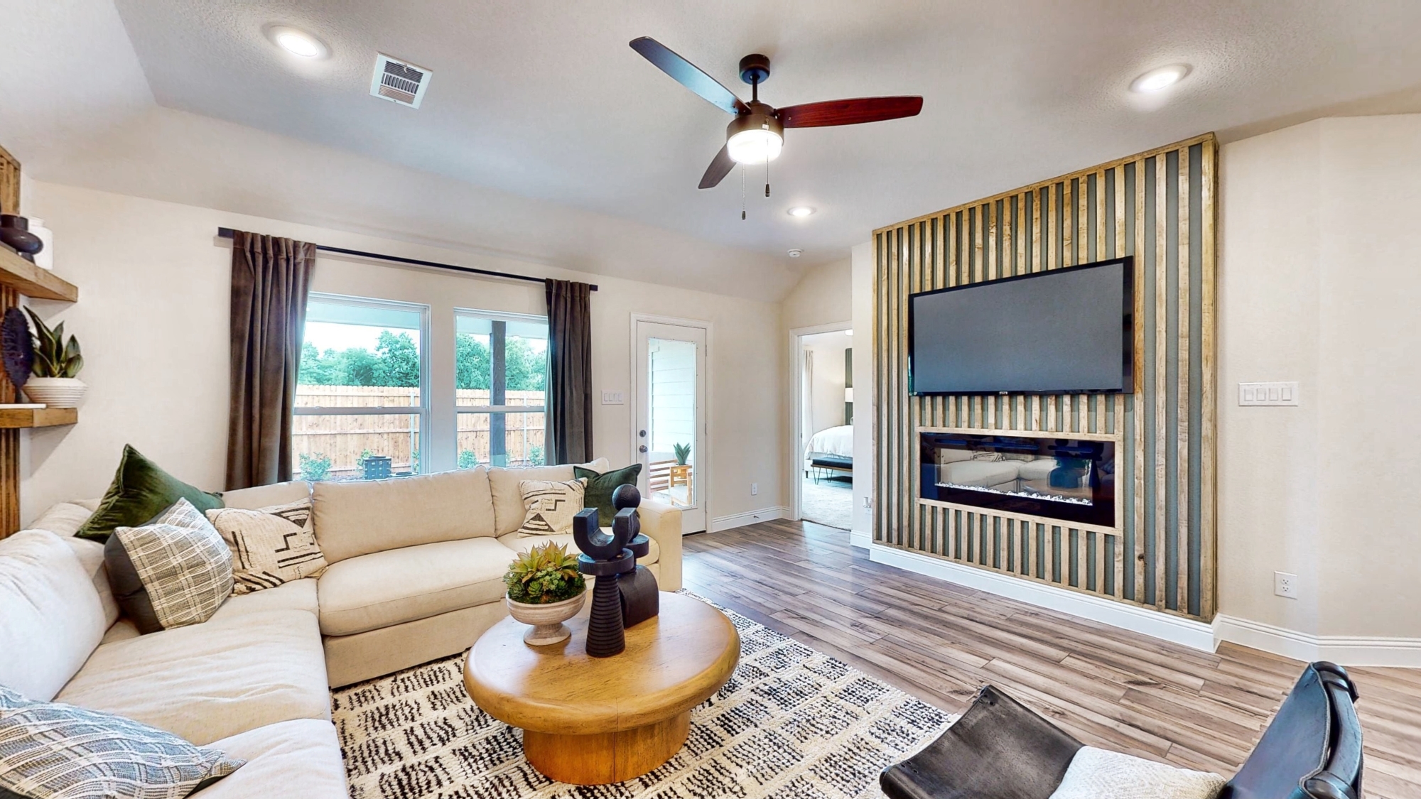 A living room with a fireplace.