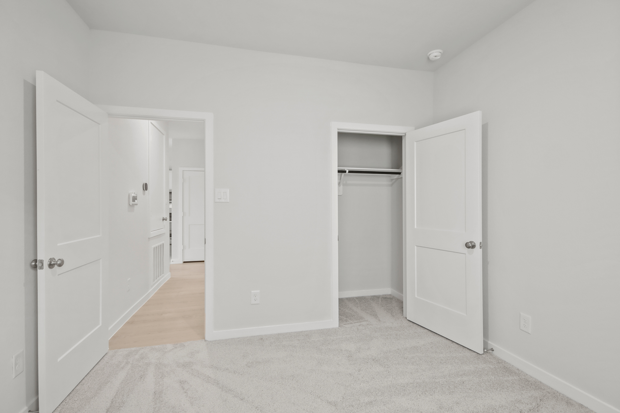 A room with white doors.