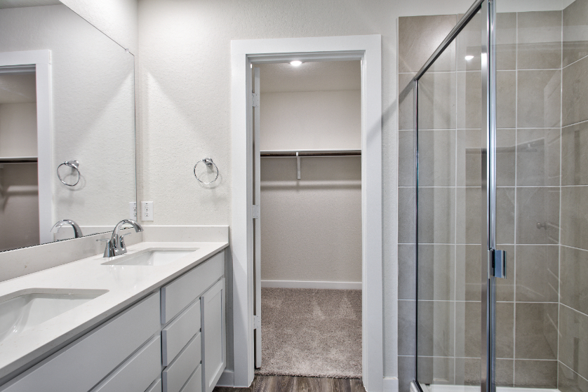 A bathroom with a glass shower.