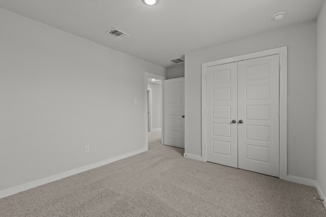 A room with white doors.