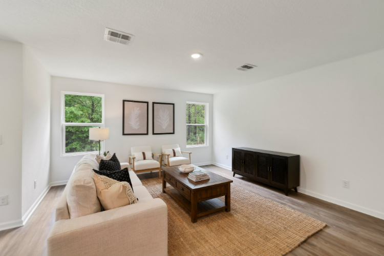A living room with a fireplace.