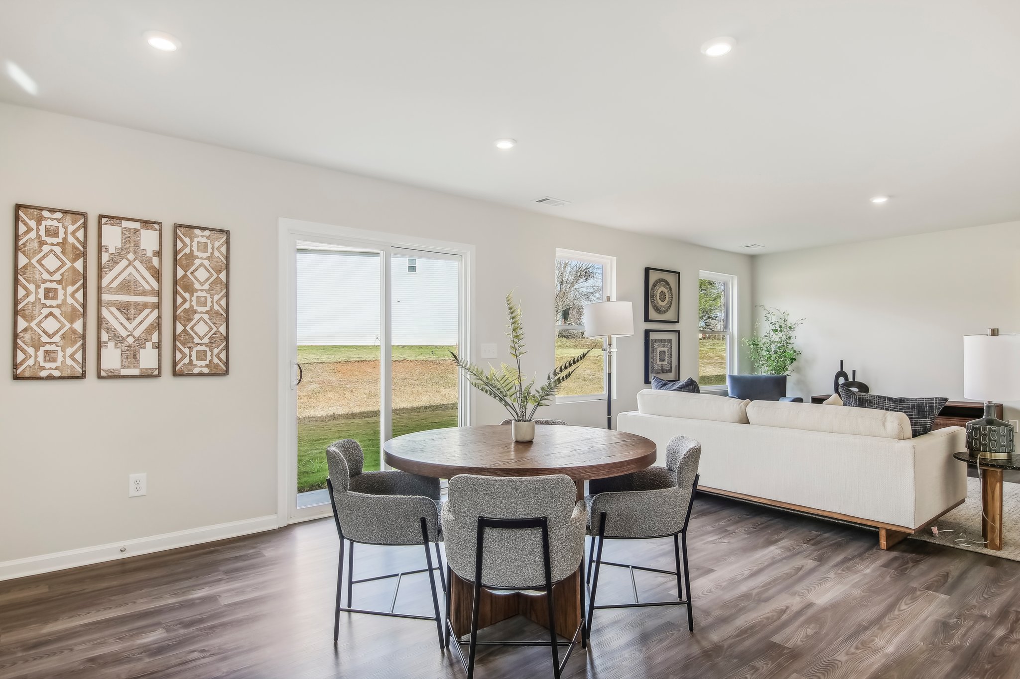 A living room with a couch and a table.