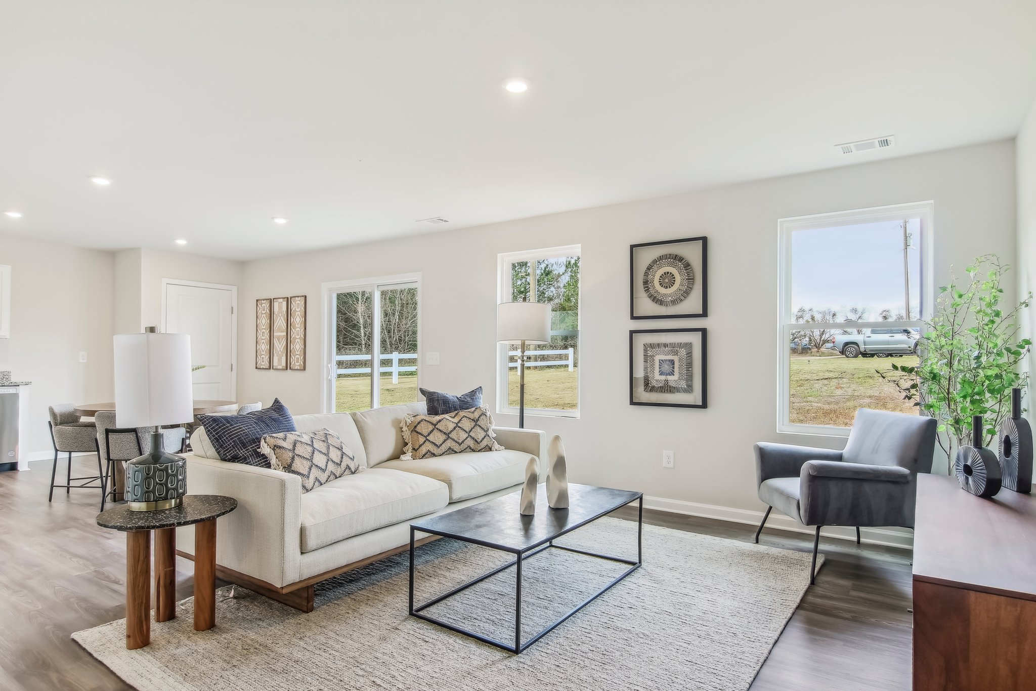 A living room with a large window.