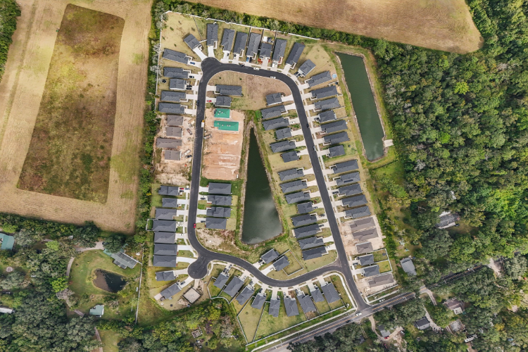 A large building with a parking lot.