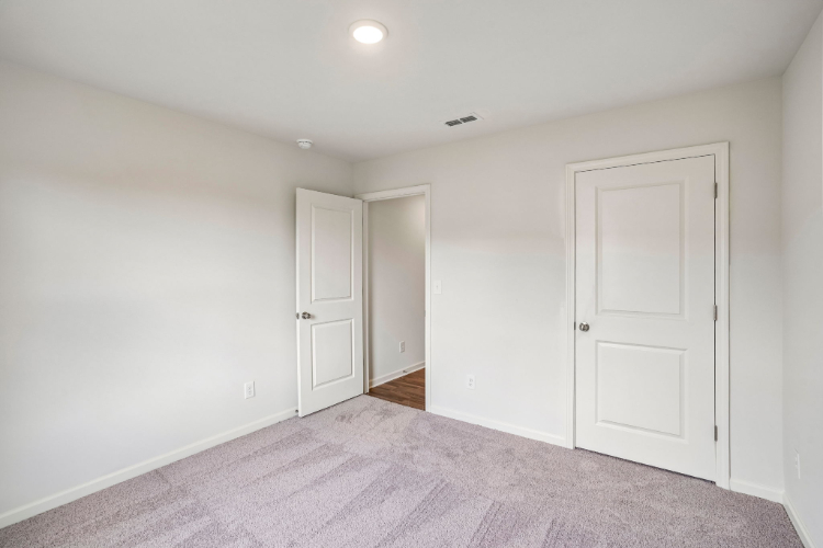 A room with white doors.