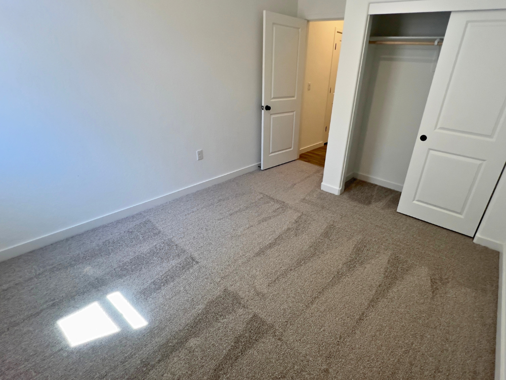 A room with white doors.